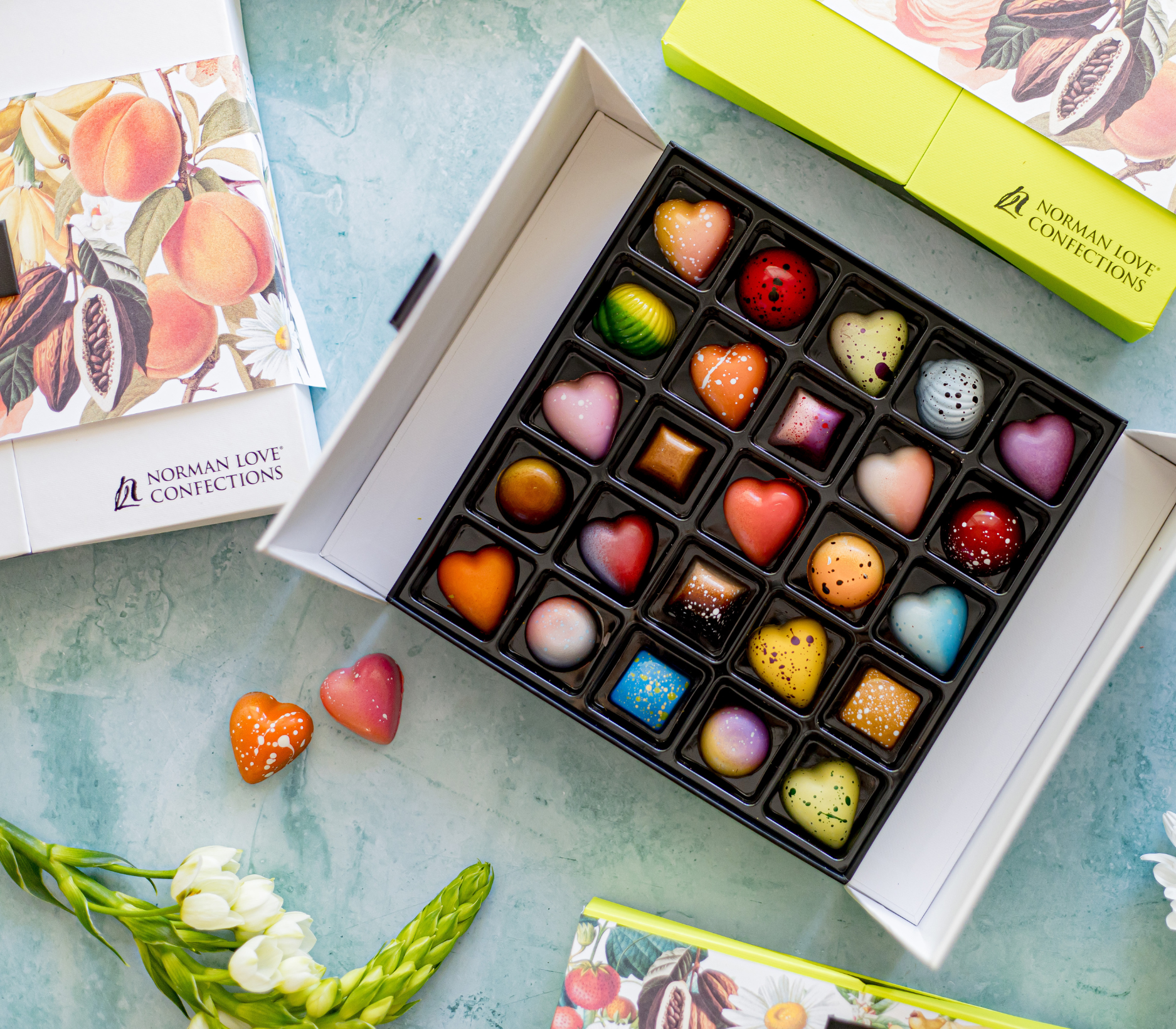 12 count heart-shaped truffles on multi-colored background. 